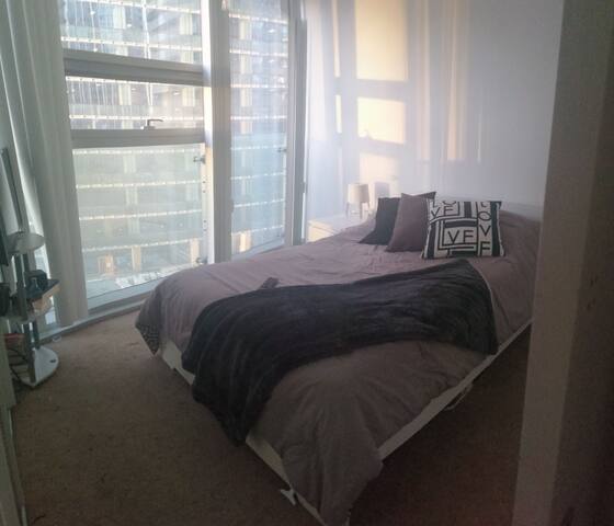 Light and airy condo with view of CN tower