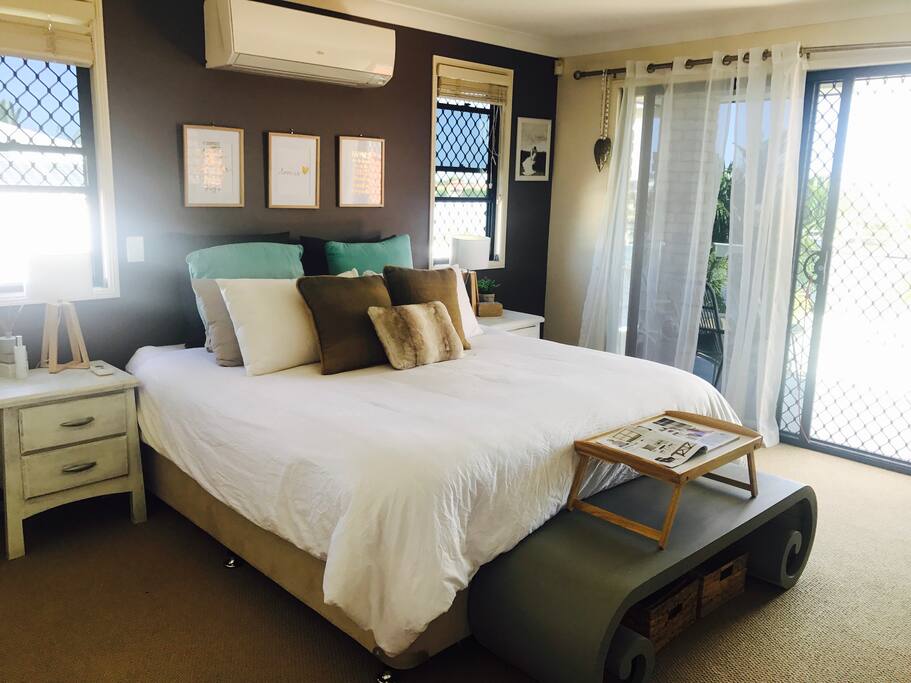 Main bed overlooking the beautiful views from the top level