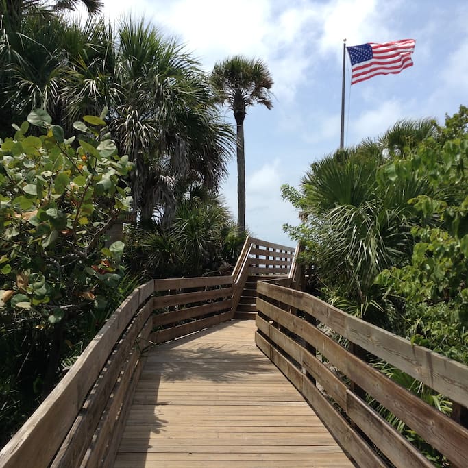 Boardwalk getting off private ferry to secluded Manasota Beach for neighborhood.