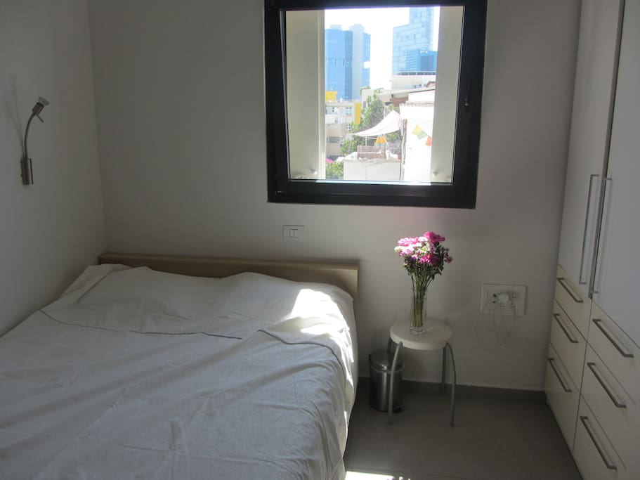Your bedroom. 140cm wide bed, lots of closet space, TV,air-con.