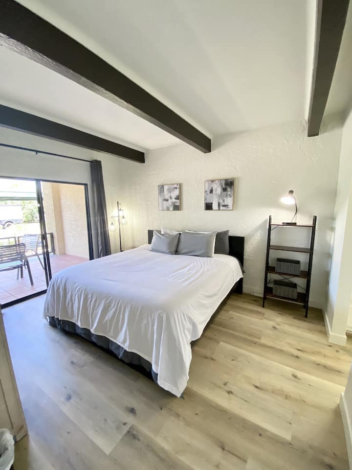 Master Bedroom has a sliding door if you want to walk outside in the morning and wireless charging for your cell phone!