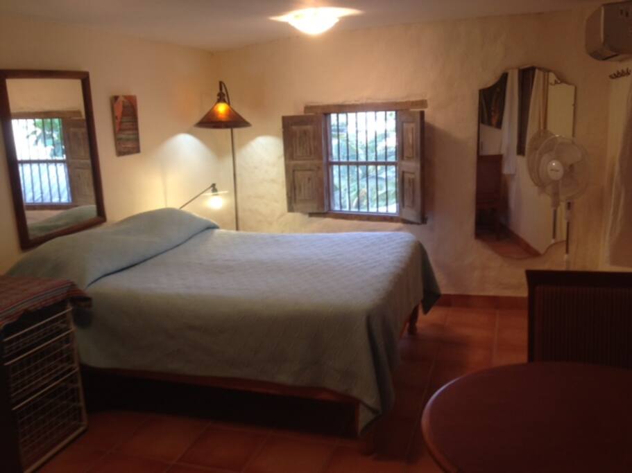 Queen bed, AC, cross breezes