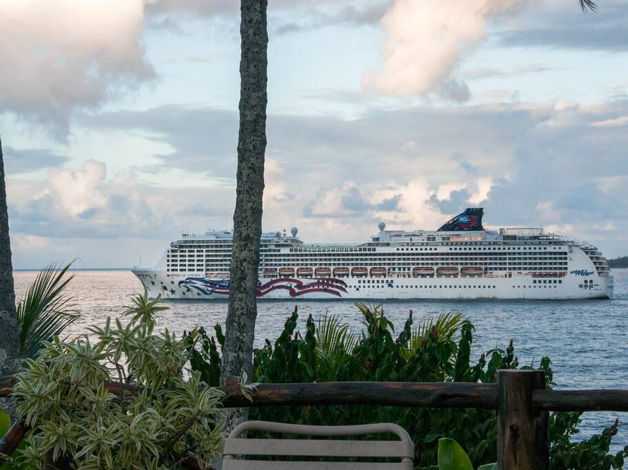 From the deck, watch the cruise ships slip away from the harbor.