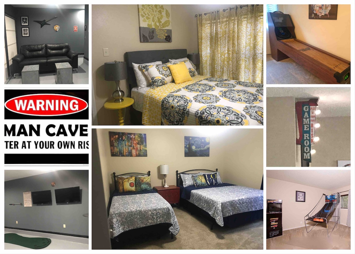 The image showcases various areas of the home, including a brightly decorated bedroom with a queen-sized bed, a game room featuring arcade games and a putting green, and a sign indicating the Man Cave. Each area reflects comfort and entertainment options for all guests.