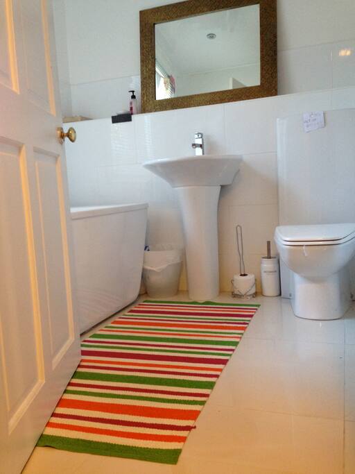 Family bathroom with large tub to soak away the days stress...