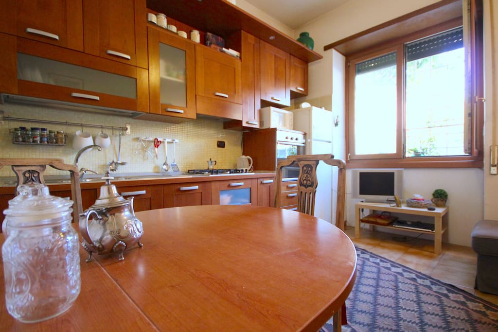 The living room with the kitchen area
