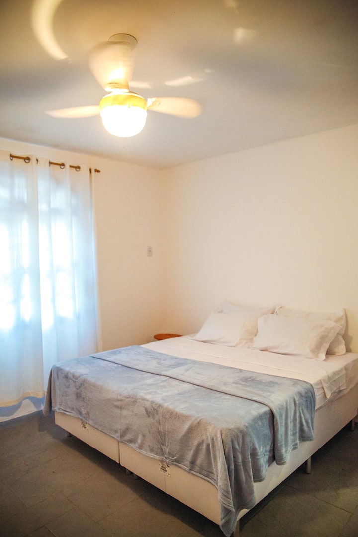 Caju Suite, 2 single beds OR 1 double bed. Ceiling Fan. Access through the gourmet area.