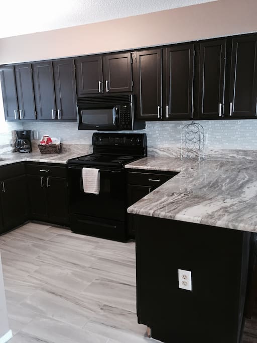 New granite and Tile in Kitchen