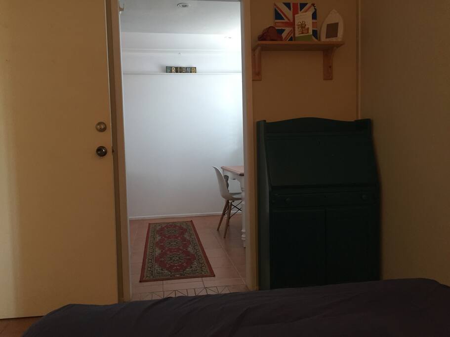 Walkin robe and sitting area off bedroom