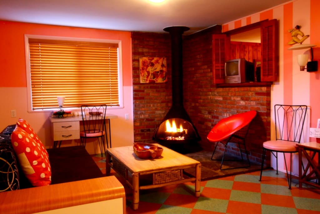 Living room with gas fireplace in Suite 5
