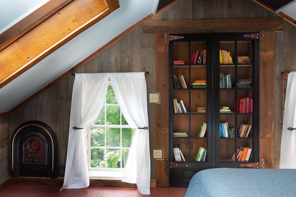 The bookshelves in the master bedroom are more than they appear.... Gently pull them open to find a hidden door.