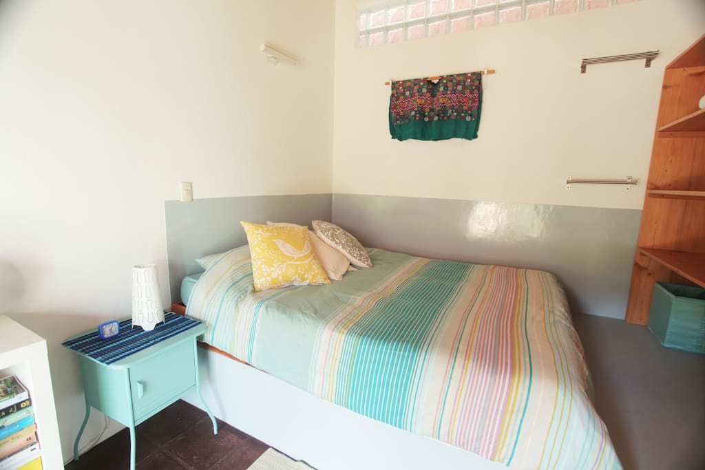 Soft lighting and very comfortable bedding.