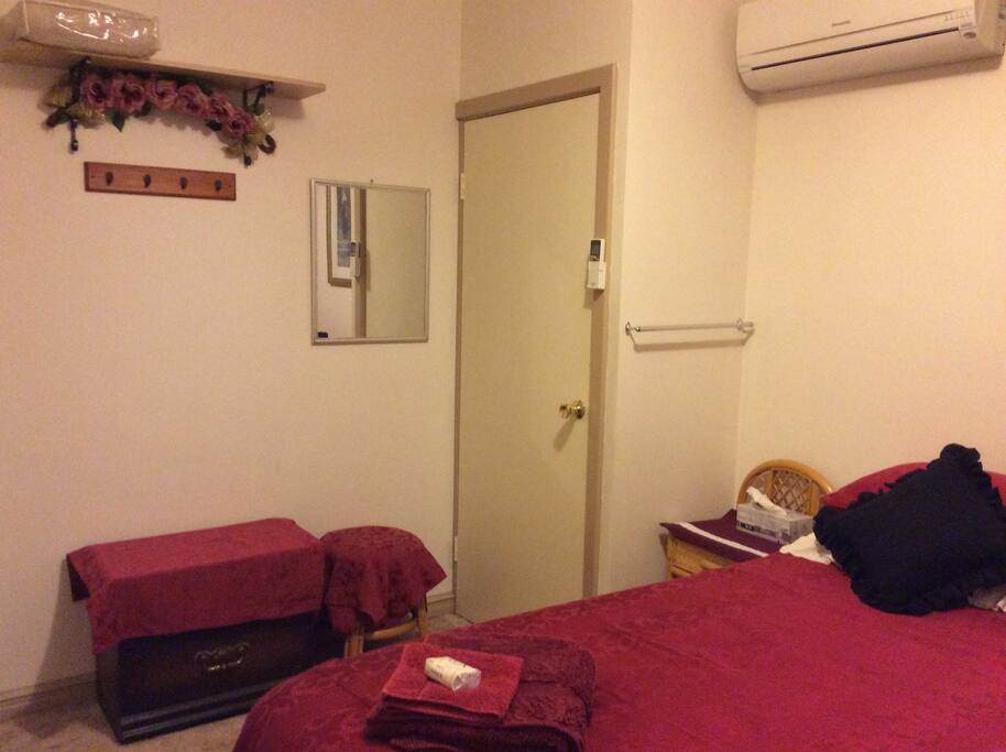 Maroon bedroom.