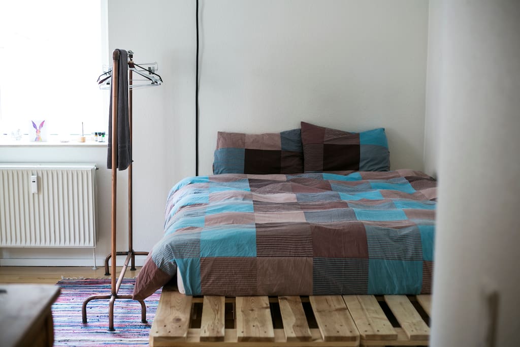 Double bed made of pallets.