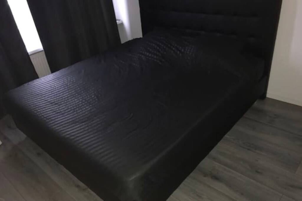 The bed is 180 x 200 cm and will be made with clean sheets.