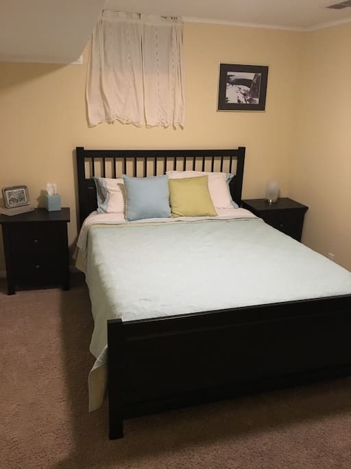 Second private bedroom with queen memory foam bed.