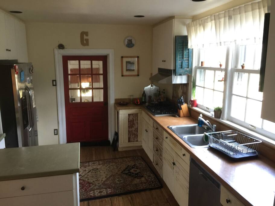 Kitchen, lots of bird feeders out those windows.