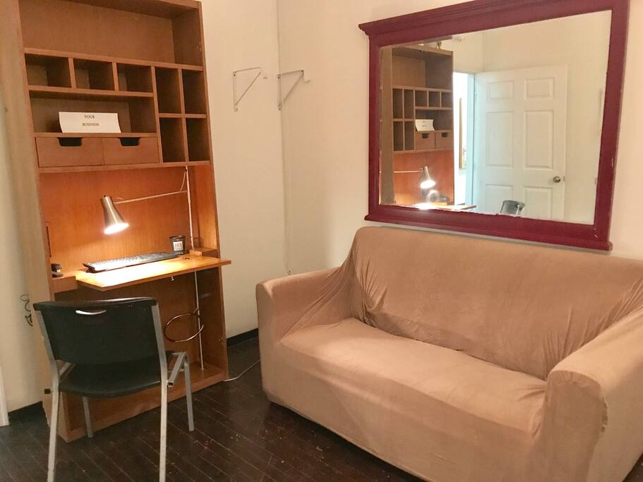 Room 400
This room has a pull out bed with couch cover , desk , chair . Wall mounted hang rack and Mirror.