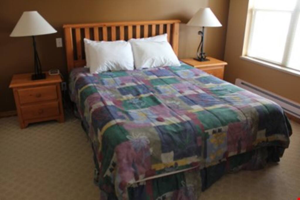 Drift to sleep in the comfortable queen bed.