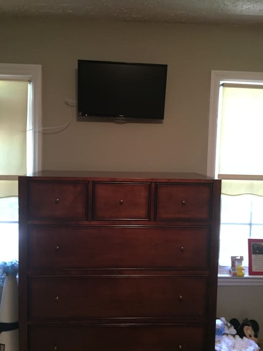 Television with chester drawers.