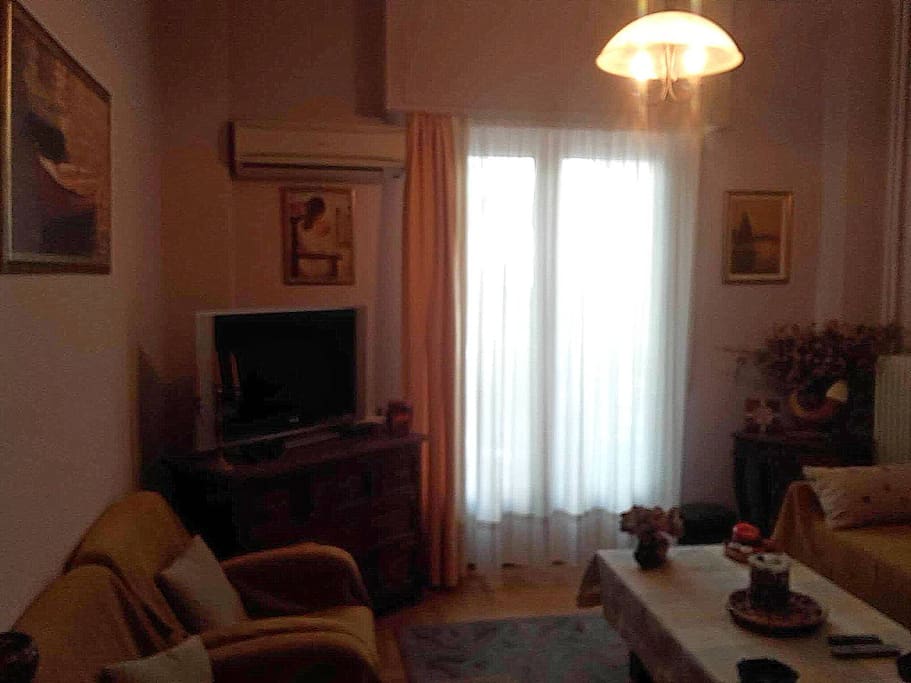 The cozy living room with LED TV