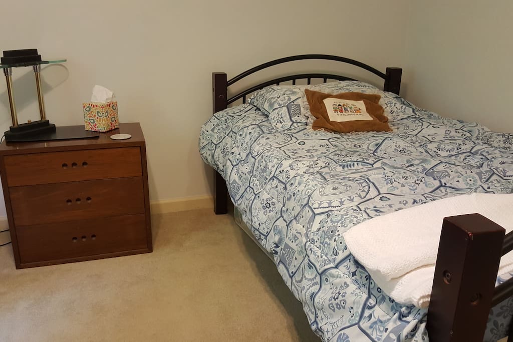 Single bedroom with shared hall bath. Additional mattress can be placed on the floor.