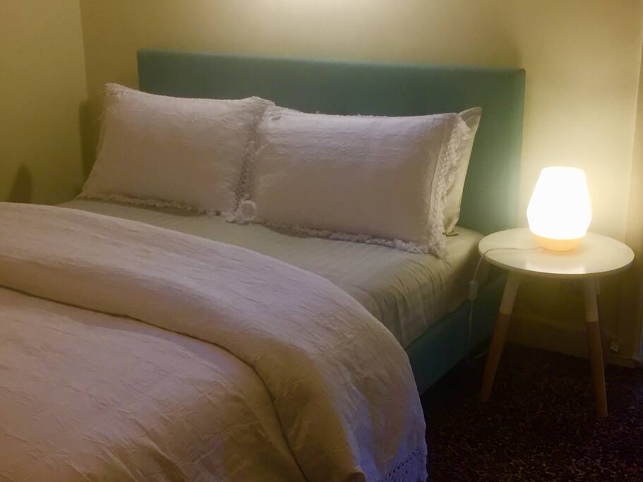 Main bedroom with beautiful Manchester queen sized bed, heaps of storage.