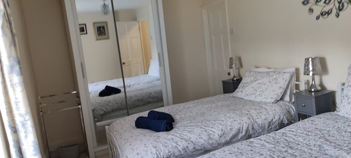 Wardrobe. Bedroom 2. Twin single beds.