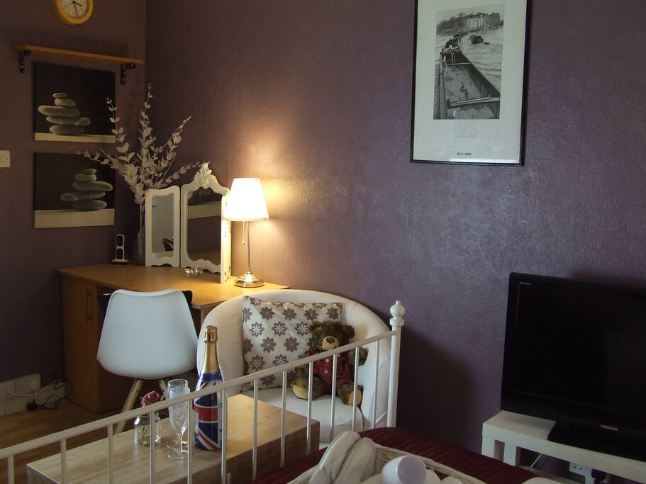 The Bedroom - Painted in relaxing lavender. Soft lighting to give a serene atmospheric calm.