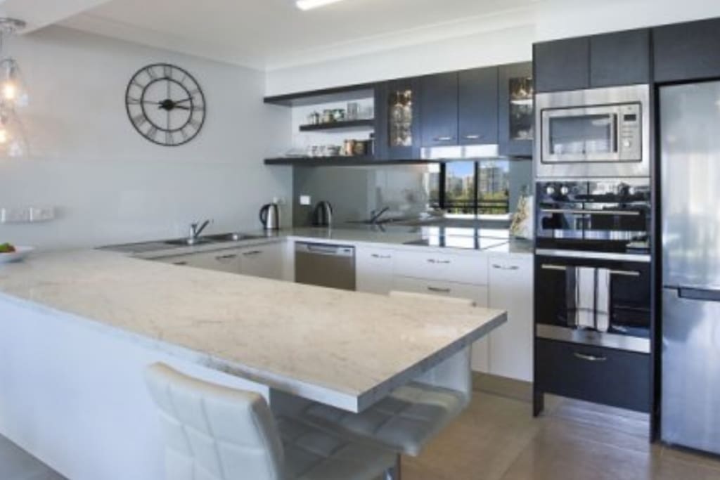 A spacious & beautifully equipped gourmet kitchen is one of the stunning features of this glorious apartment!