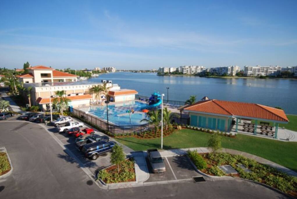 Olympic pool with fun slides on the bay, with waterview gym and beautiful park located outside your window.