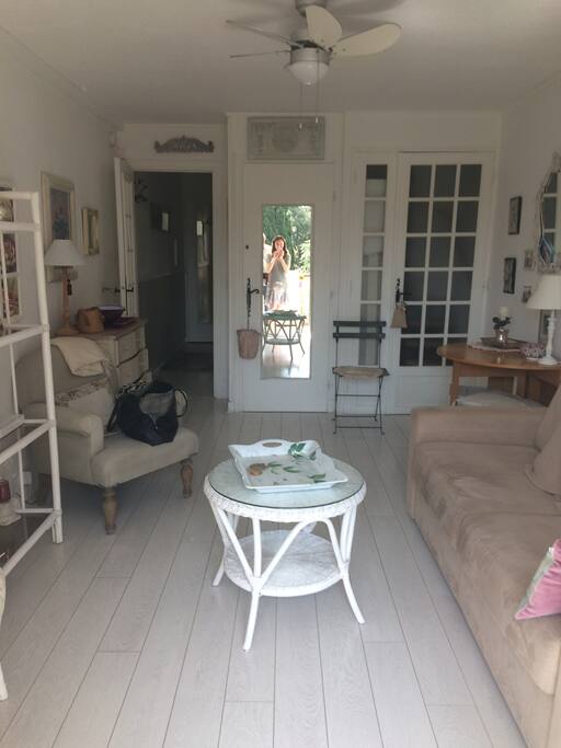 Bright living area, facing on to the landscaped gardens. Contains double sized sofa bed.