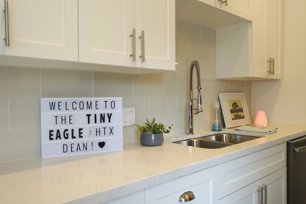 Welcoming and wonderful, bright, crisp quartz countertops