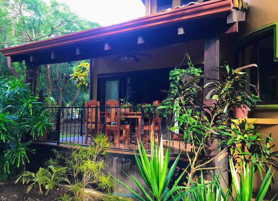 Covered front patio and dining area