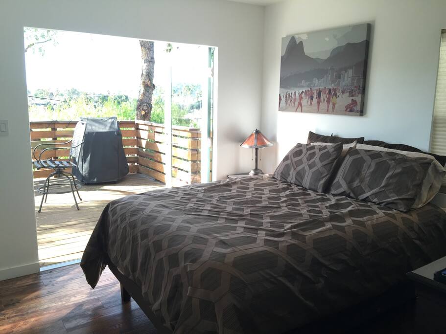 Master Bedroom - luxury pillow top mattress, adjustable base, deck access