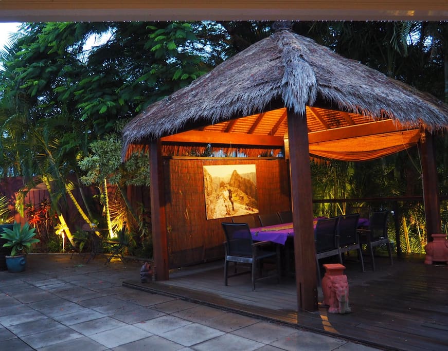 The Bali hut surrounded my palms at night. Perfect for a relaxing dinner.
