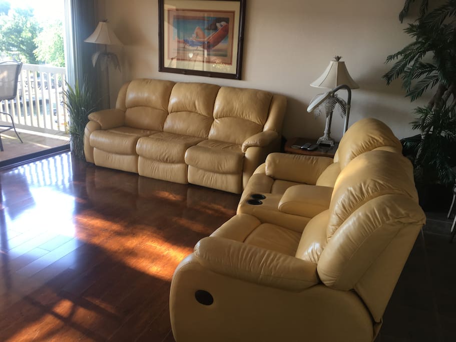 Fully updated living with leather sleeper sofa to sleep a total of 6.