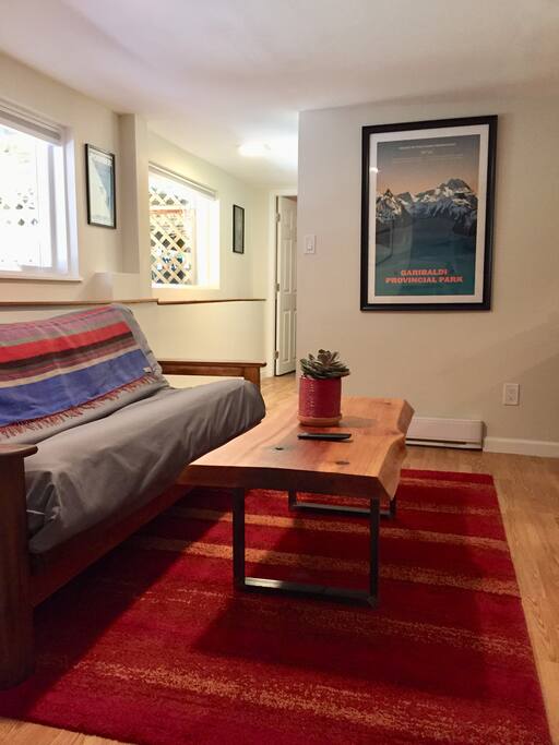 Nicely appointed living room with local artwork