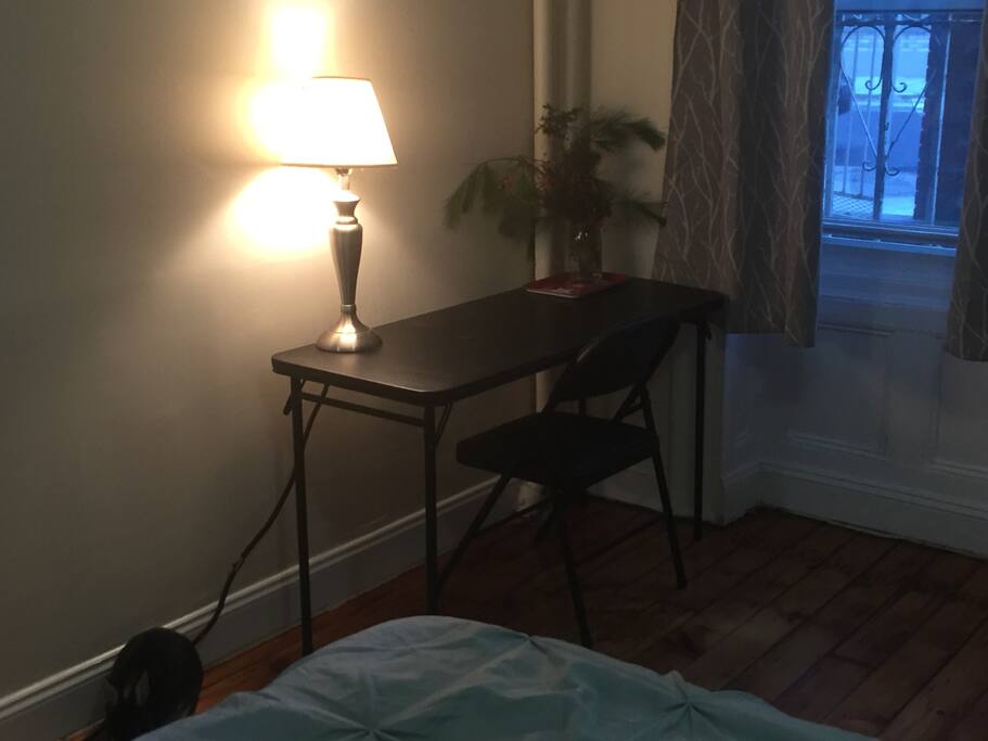 Desk, lamp and sometimes a little rabbit may say hello!