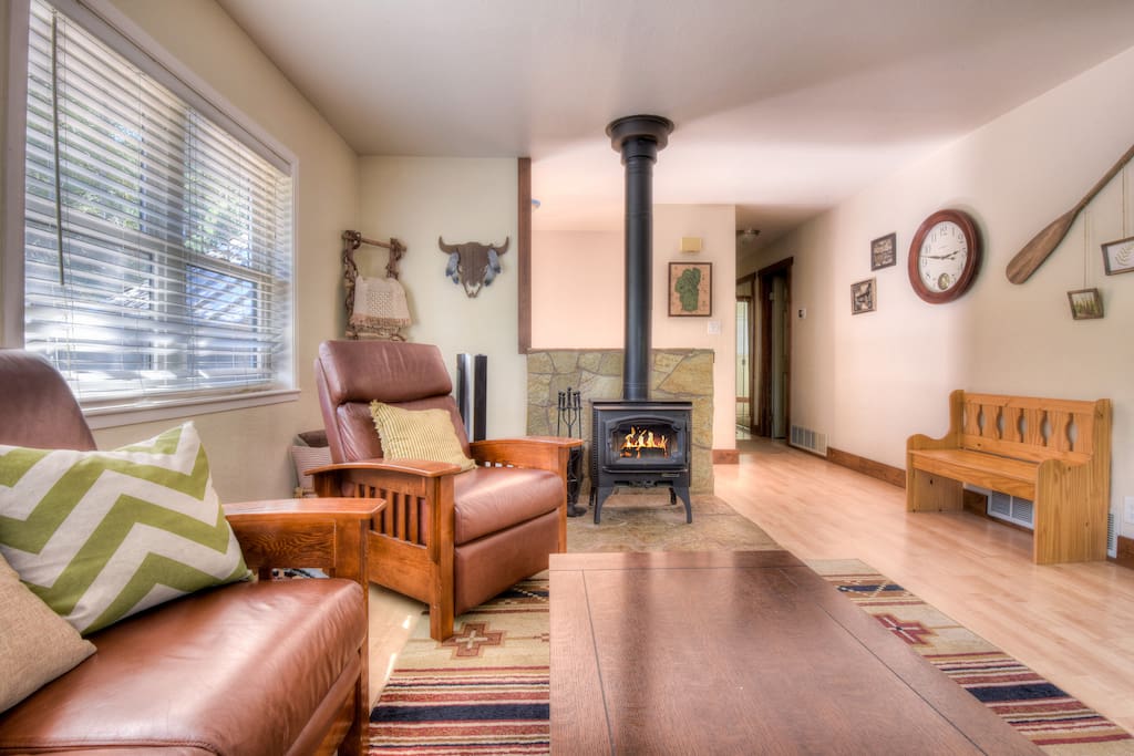 Living room with stove and beautiful Tahoe decor