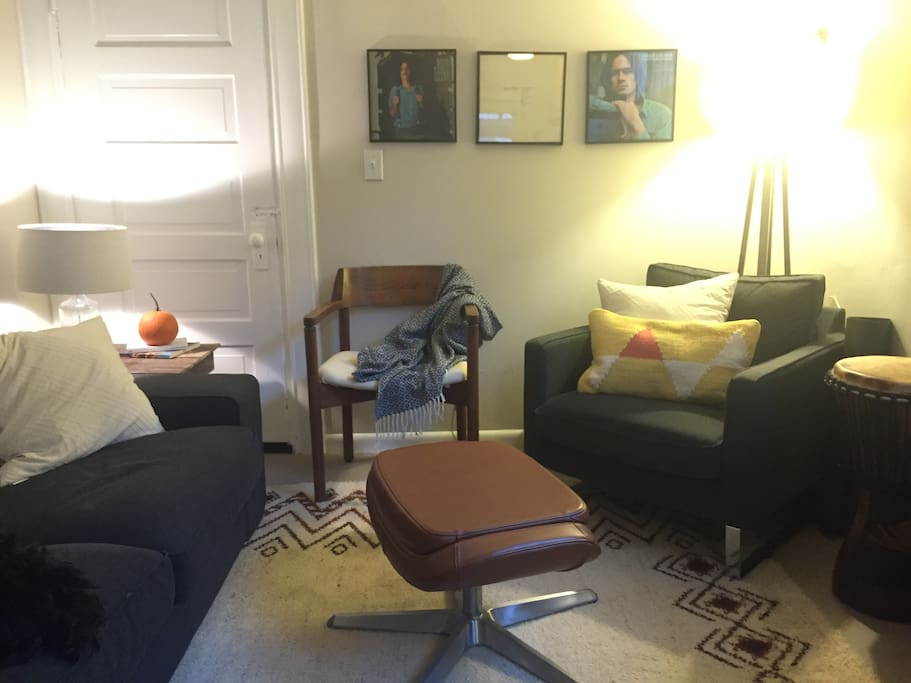The living area is peaceful and cozy - complete with more throw blankets than you've ever seen!