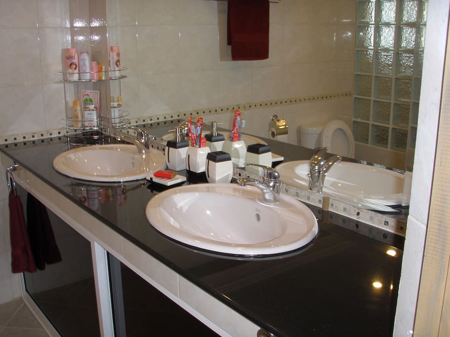 double wash hand basins in both bathrooms.