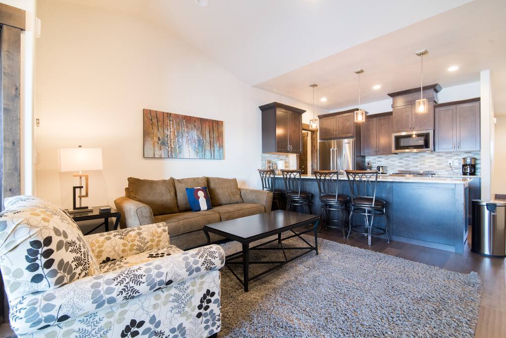 Family room with view of adjacent kitchen
