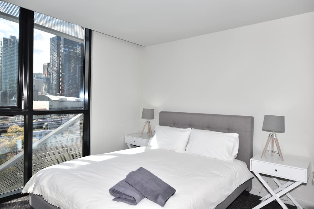 Bedroom 1 is light filled with block out blinds and a comfy queen sized bed