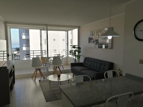 Beautiful new apartment a short block to the beach