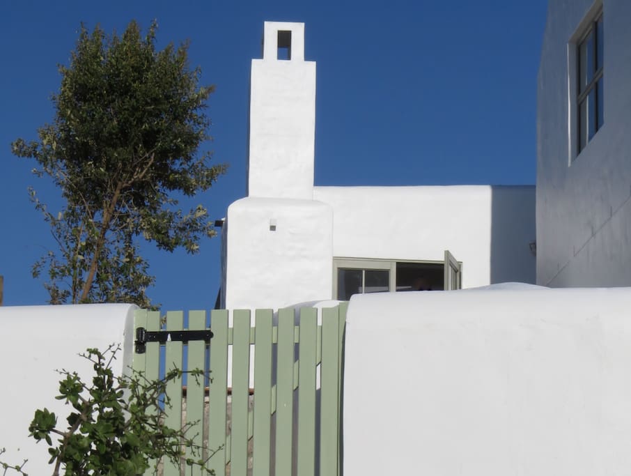 Private garden gate from beach side