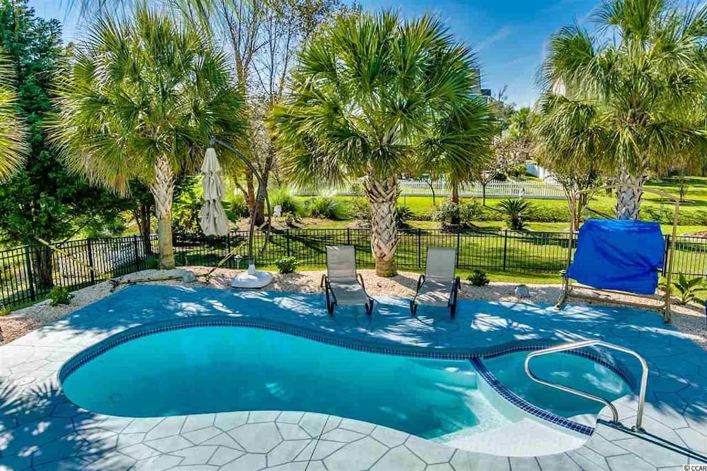 Pool and hot tub view from the deck