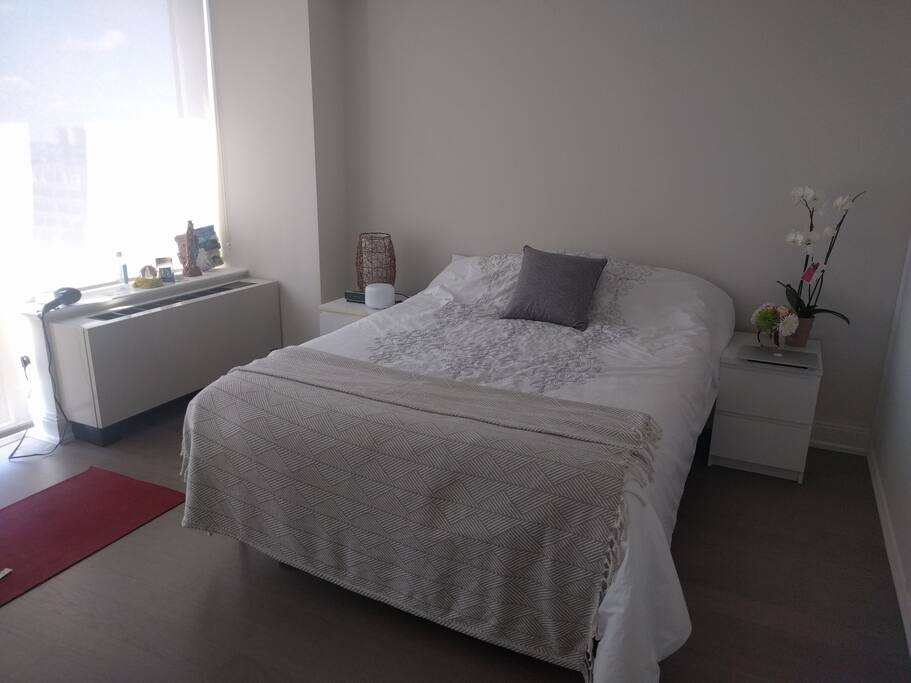 Most amazing cozy king size bed to come home to after walking in the city all day.