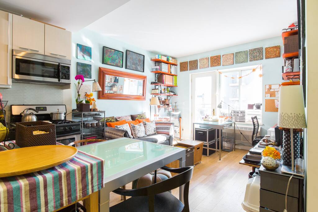 The living room gets lots of sunlight and you are welcome to hang here.