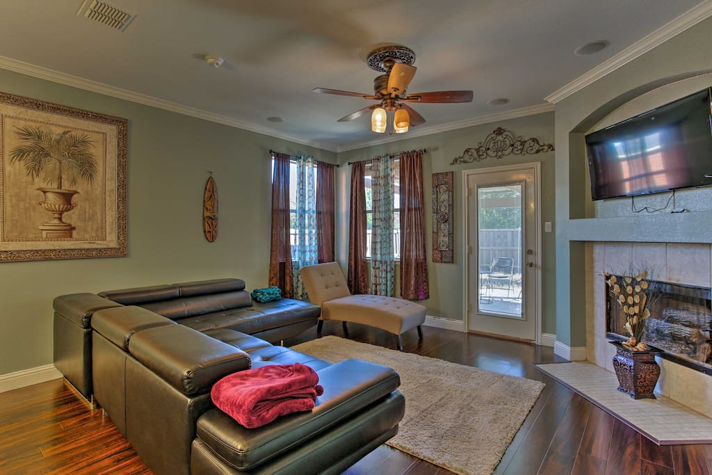 This spacious 1,723-square-foot property offers an interior with hardwood floors